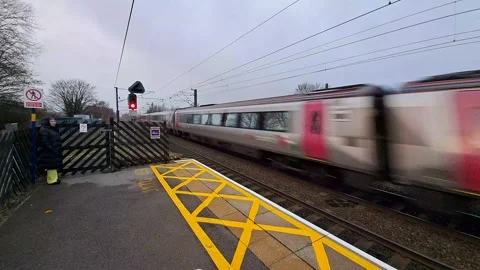 Super speed train passing train station. Stock Footage 234419939