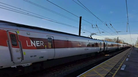 Super speed train watched from the platform. Stock Footage 233825054