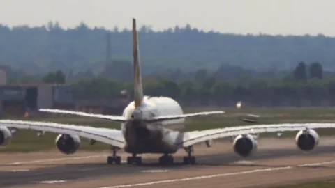 Super-telephoto shot of plane accelerating before take off v2 Stock Footage 111525129