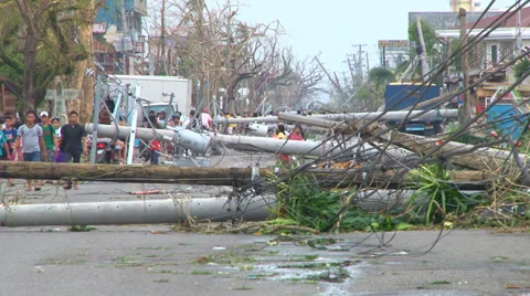 Super Typhoon aftermath fallen concrete power poles Stock Footage 33958037