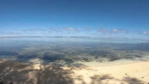 Super wide angle horizontal view of calm peaceful turquoise blue lagoon look out Stock Footage 235322421