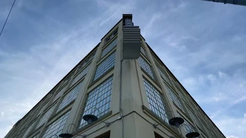 Super wide angle pan shot of old downtown building at dusk in summer Stock Footage 156334192