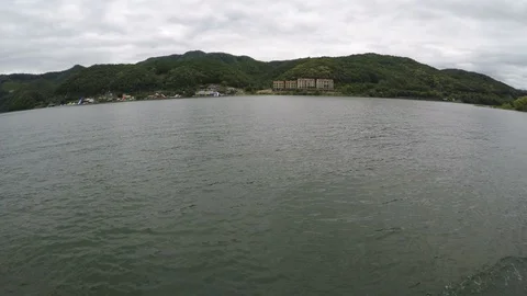 Super wide angle view of Nami Island, South Korea from ferry boat Video stock 95079321