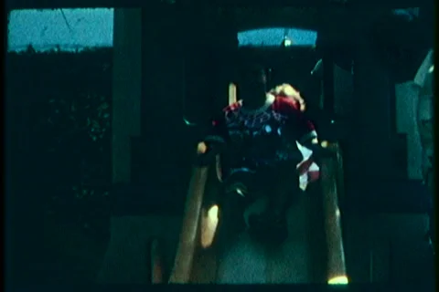 Super8 children on the slide Stock Footage 40736058