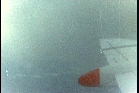 Super8 plane flying in the clouds Stock Footage 40736607