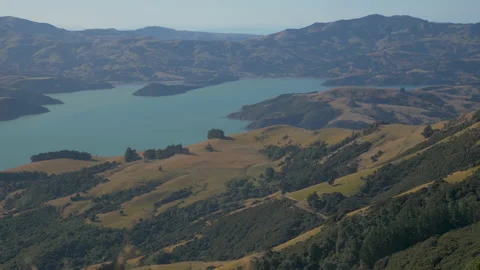 Superb view on the blue water of the Akaroa Harbour peninsula, in New Zealand Stock Footage 217396910