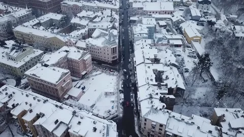 Superb view from a height of the snow-covered old town. Cold weather, long 스톡 동영상 229458238