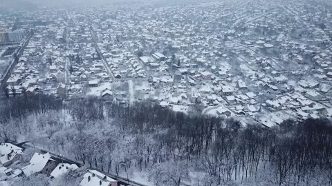 Superb view from a height of the snow-covered old town. Cold weather, long Stock Footage 229594739