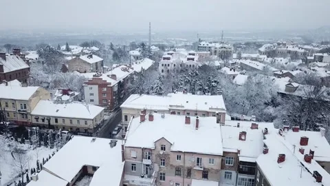 Superb view from a height of the snow-covered old town. Cold weather, long Stock Footage 229908723