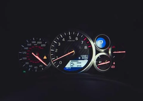 Supercar Dashboard Instruments Panel With Red Needles And White Backlight Stock Photos