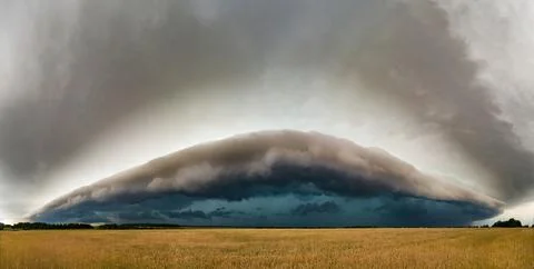 Supercell, shelf, arcus storm clouds over the fields in summer Foto stock