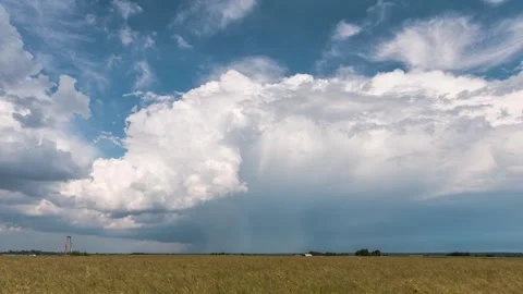The Supercell storm moves above a grain fields. Stock Footage 301428655