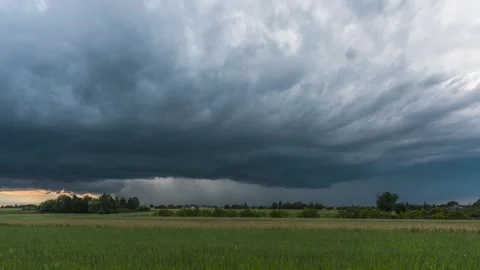 A supercell storm with a rotating mesocyclone and a strong rain core. Stock Footage 301424396