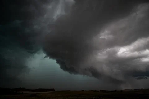 Supercell Thunderstorm with Dramatic Dark Clouds Stock Photos