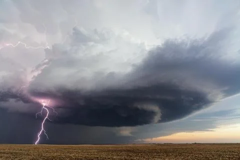 Supercell thunderstorm with lightning strike Stock Photos