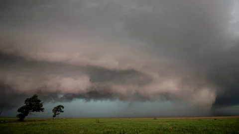 Supercell thunderstorm time lapse with approaching shelf cloud Stock Footage 107748227