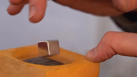 Superconductor and nitrogen, experience with liquid nitrogen cooling and magnet. Stock Footage 122155464