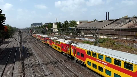Superfast New Double Decker train speed Aerial view Indian Railways Mumbai India Stock Footage 131807480