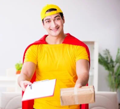 Superhero delivery guy with box Stock Photos