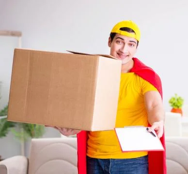 Superhero delivery guy with box Stock Photos