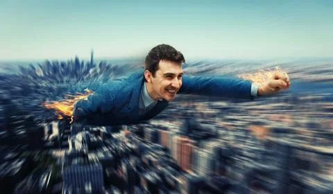 Superhero over the city Stock Photos