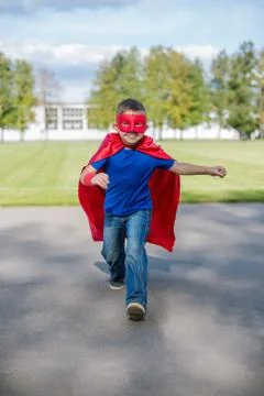 Superhero running forward Stock Photos