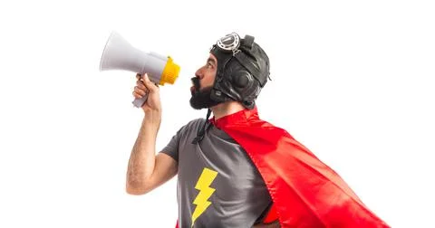 Superhero shouting by megaphone Stock Photos