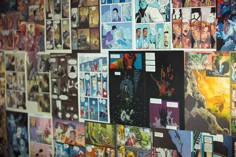 Superheroes posters at wall with selective focus Stock Photos
