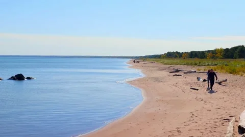 SUPERIOR, WI - 5 OCT 2020: Beach at Wisconsin Point on a sunny day. Stock Footage 148170302