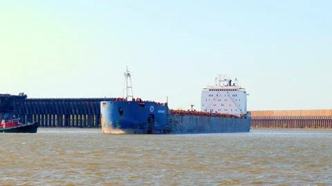 SUPERIOR, WI - 5 OCT 2020: ALGOMA GUARDIAN ship pushed by a tug boat. Stock Footage 148356982