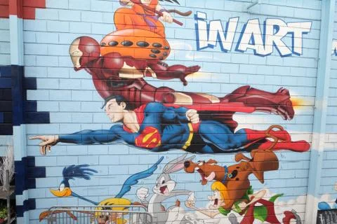 Superman, graffiti wall mural comic book, flea market in Paris Stock Photos