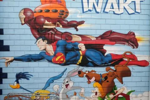 Superman, graffiti wall mural comic book, flea market in Paris Stock Photos