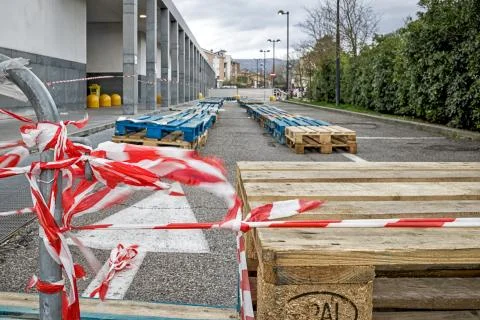 Supermarket car parks cordoned off during  coronavirus lockdown, Arezzo Italy. Stock Photos