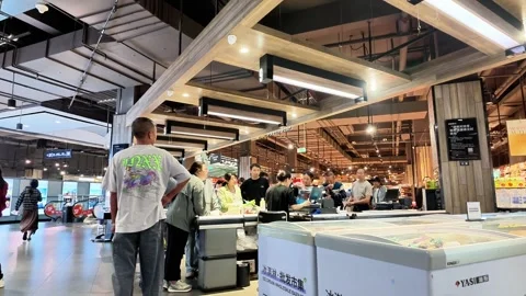 Supermarket Checkout Counters With Queuing Customers Stock Footage 345974600