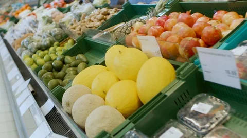 At the Supermarket: Gliding Shot of the Fresh Produce Section of the Store. Stock Footage