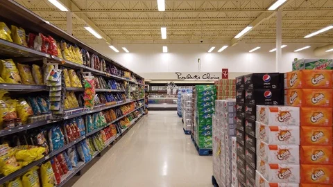 A Grocery Store Aisle at a Walmart Store with No People Editorial