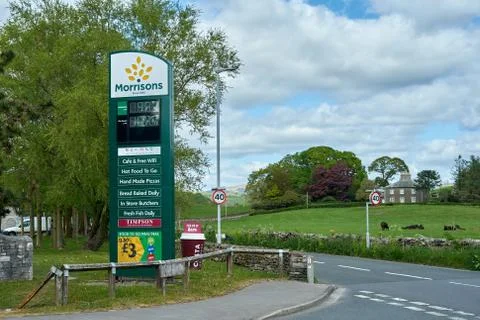 Supermarket petrol/gas prices and store facilities sign Stock Photos