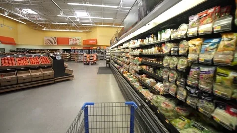 Supermarket Shopping Inside Walmart Aisle with canned food, dry snacks. Stock Footage