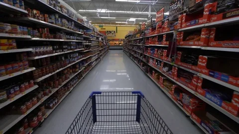 Supermarket Shopping Inside Walmart Aisle with canned food, dry snacks. Stock Footage