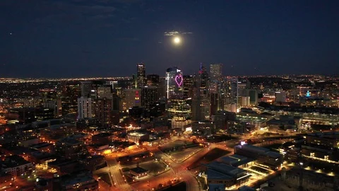 Supermoon Rising Over Denver Captured From Drone - Pull Out From City Stock Footage 128593366