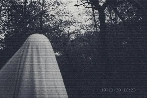 A supernatural concept. Of a ghost with sheet over it's head. Stock Photos
