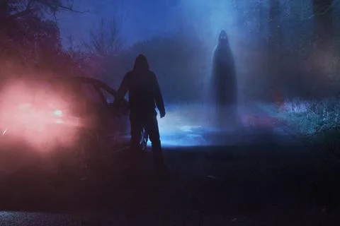 A supernatural concept of a spooky ghost floating above a road. With a driver Ilustração Stock