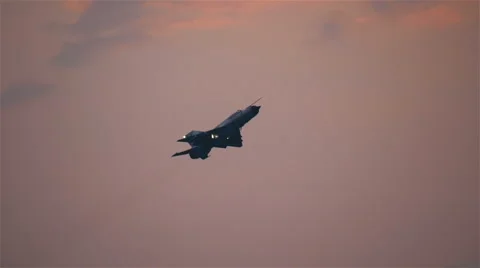 Supersonic Jet Fighter in Flight at Sunset Stock Footage 65762310