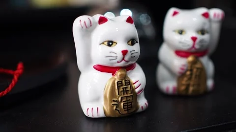 Superstition cat like cartoon figure model close up shot. Bring prosperity, luck Stock Footage 279963341