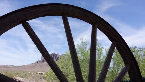 Superstitions mountains cloud timelapse with wagon wheel foreground Stock Footage 78487261