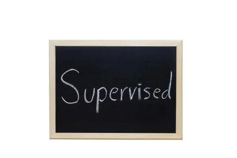 Supervised written with white chalk on blackboard. Stock Photos