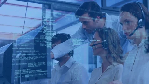 Supervisor assisting a colleague in an office Stock Footage 107706030