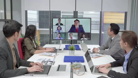 Supervisor of the business team is presenting operation of machines in meeting Stock Footage 149706113