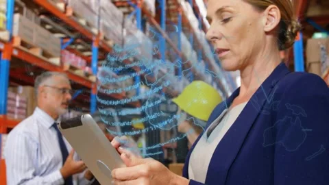 Supervisor gesturing, ops manager tapping tablet, holographic globe forming, Stock Footage 332290315