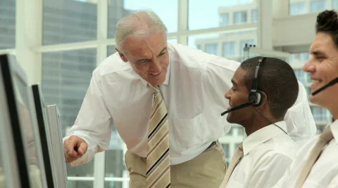 Supervisor Managing a Call Center Team Stock Footage 853700